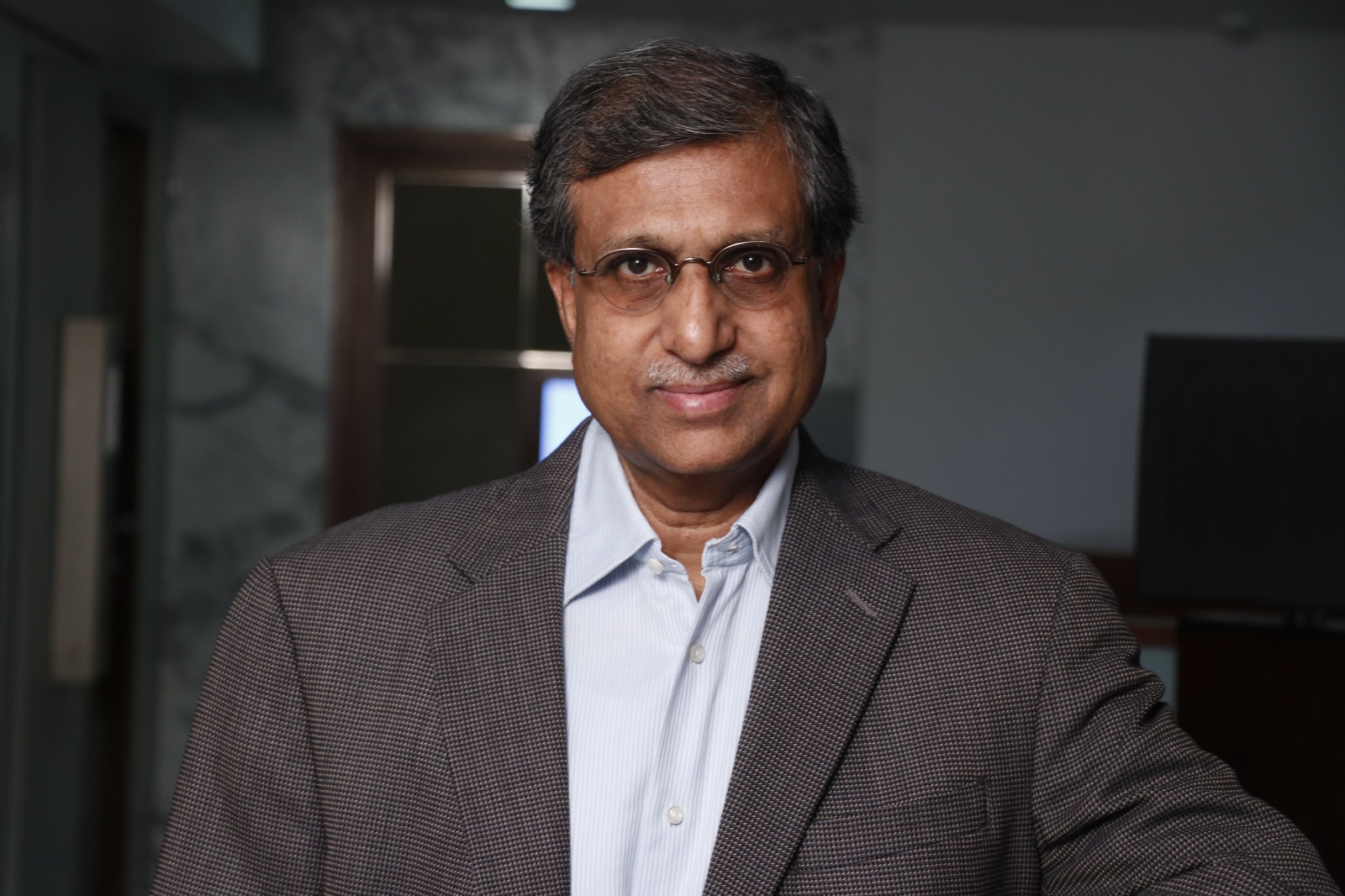 Krishna Prasad Atluri — professional portrait